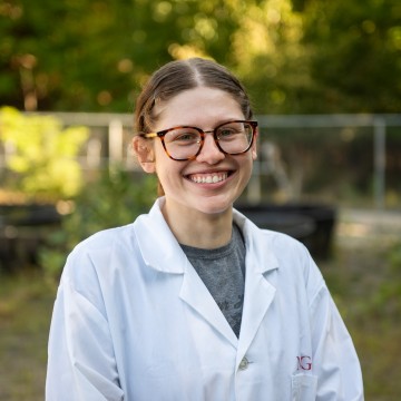 A scientist outside.